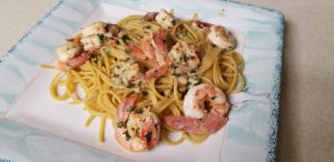 Shrimp and pasta on plate