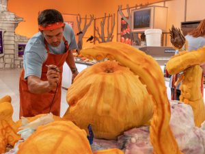 Chad Gainey sculpting an octopus out of pumpkins on Halloween Wars