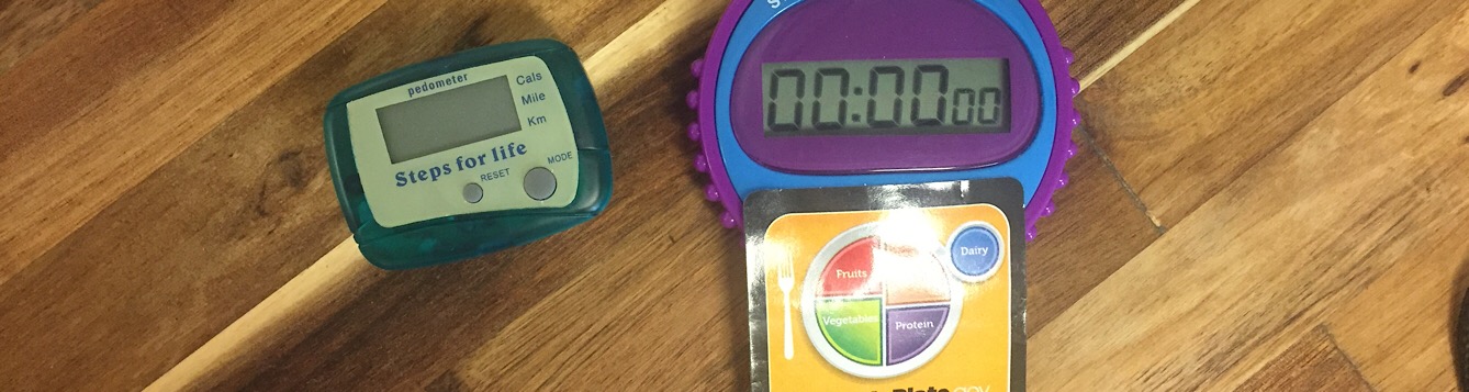 photo of a pedometer and stop watch