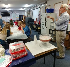 4-H Leader Chris Vann discussing the rules of the Bake-Off