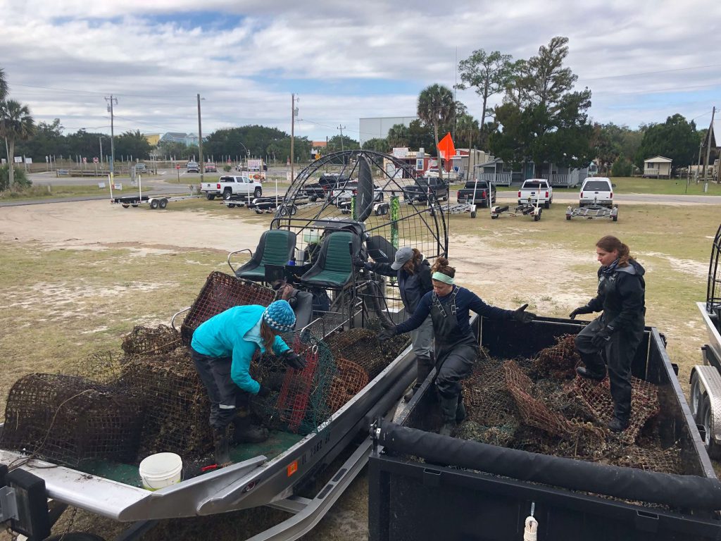 unloading crab traps from boat