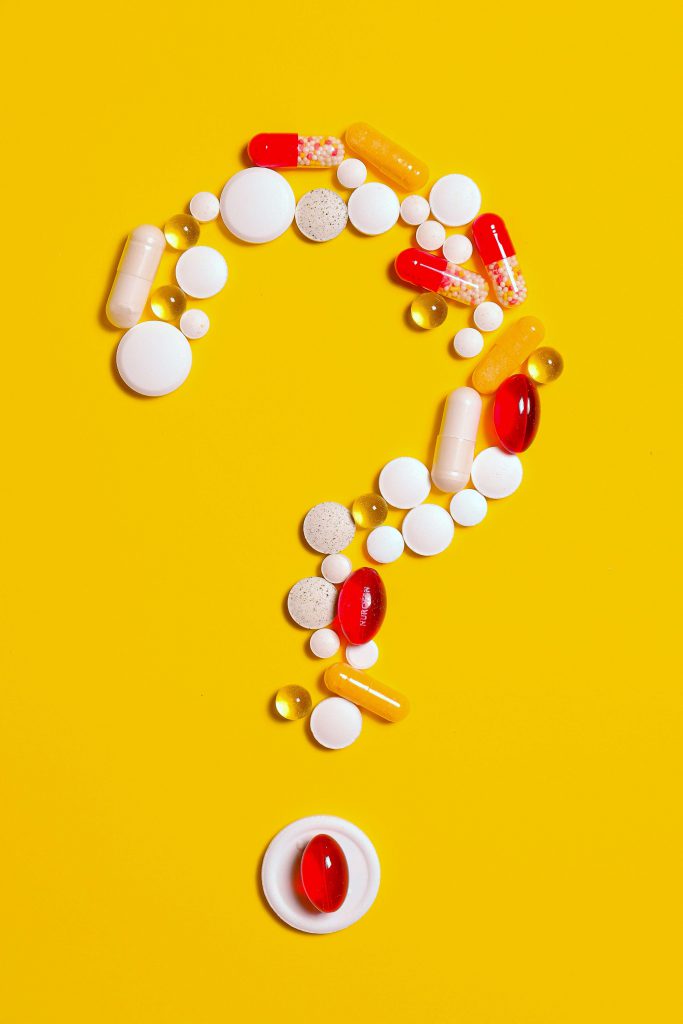 Question mark made up of pills