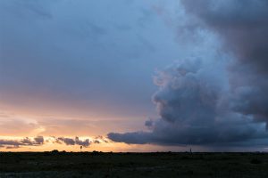 Cumulonimbus clouds on horizon