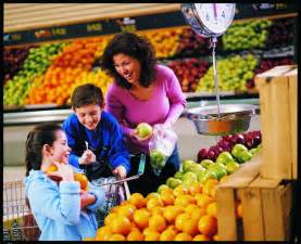Family Shopping for fresh fruit