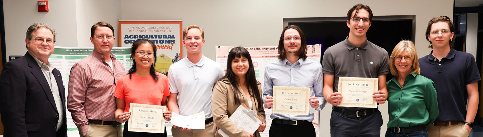 Winners of the Joe E Collins II Award pose with their certificates in the Frazier Rogers atrium