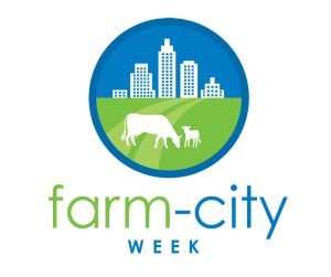 Logo for Farm-City Week 2024; illustration of buiding with silhouettes of cows in foreground.