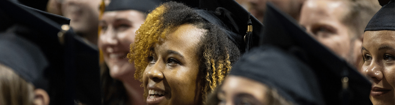 Graduates sitting at their ceremony.