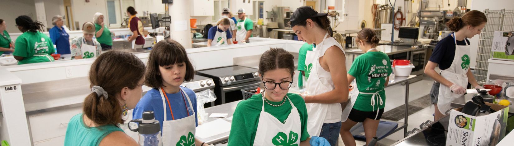 4H youth participating in a cooking workshop at 4H University.