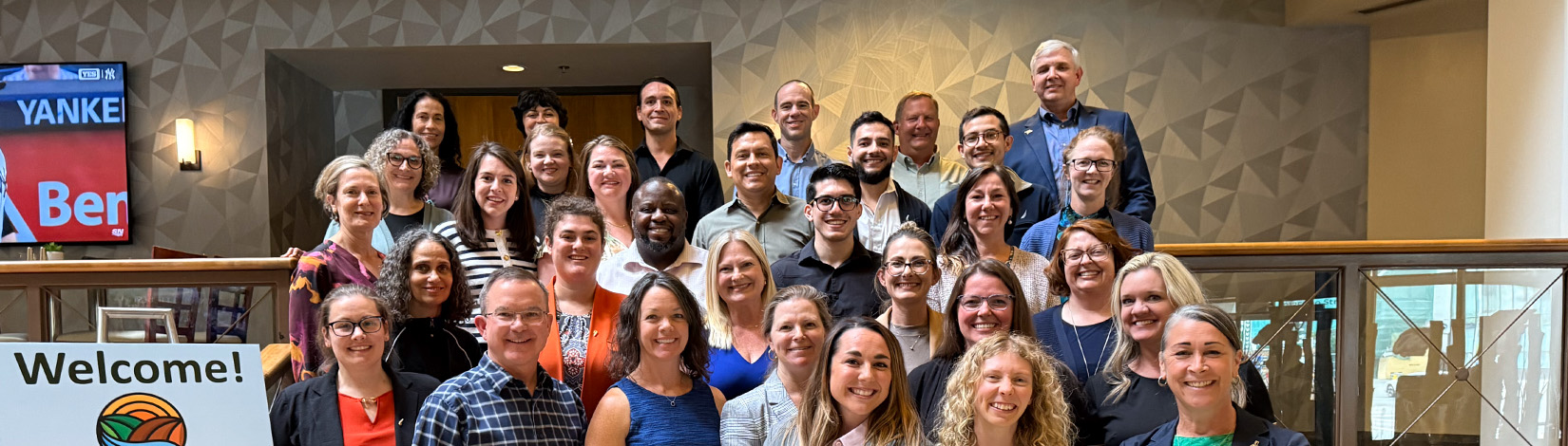 Teachers and graduate students gathered for a group photo at a teaching conference.