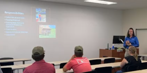women teaching about agriculture