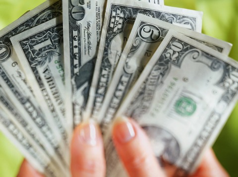 hand holding currency