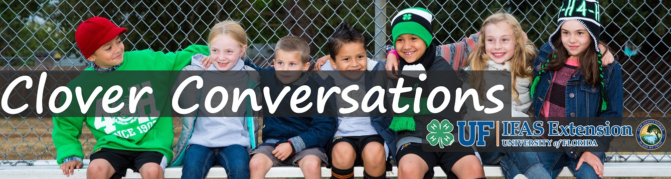 A diverse group of smiling, laughing youth.