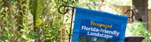 A garden flag designating a Florida-Friendly yard.