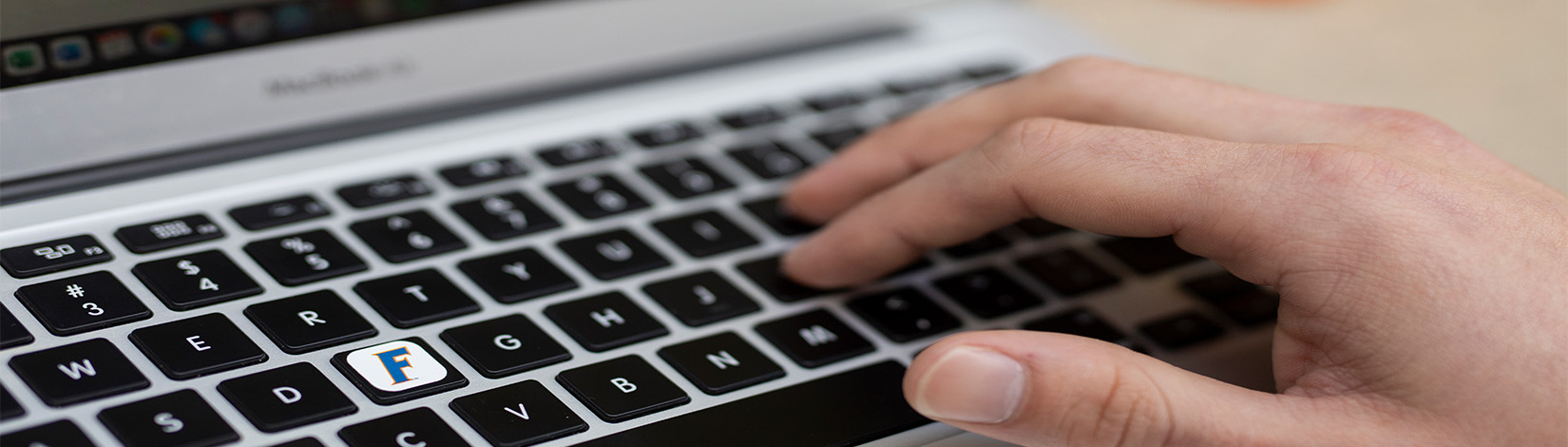 Hand on a computer keyboard. Photo taken 10-27-21. UF/IFAS Photo by Tyler Jones.