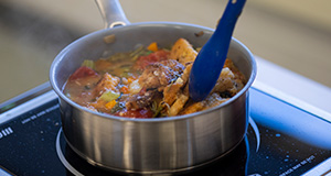 An Italian stew cooking in a pot on a hot plate. Photo taken 02-26-25. UF/IFAS Photo by Tyler Jones.