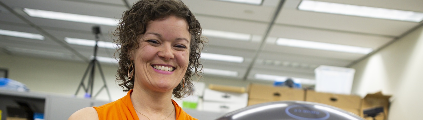 Katie Stofer with a digital globe. Photo taken 04-09-19.