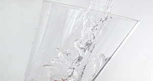 Water pouring into glass.