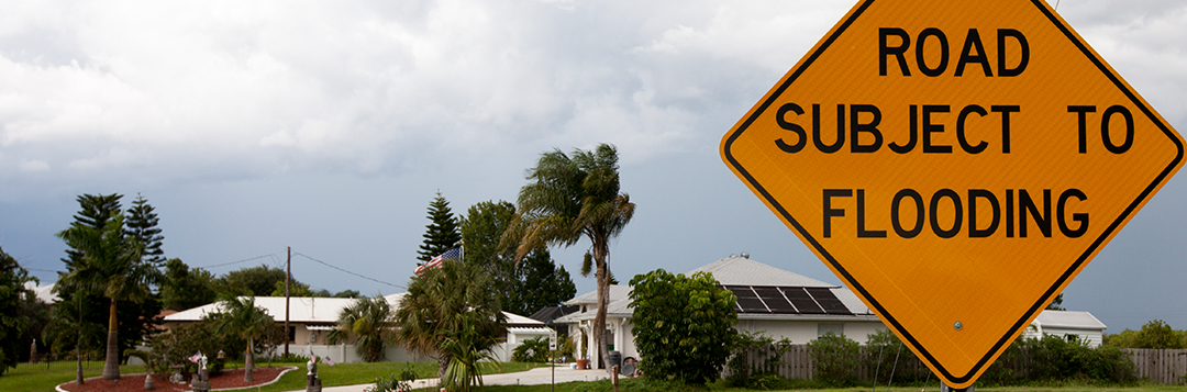 caution sign: Road Subject to Flooding