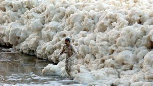 Gobs of sea-foam wash up in Spanish town. Here's why.