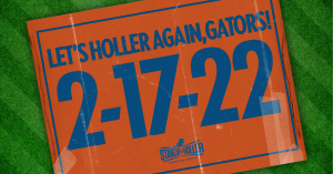 An orange sign reads "Let's holler again, Gators! 2-17-22"