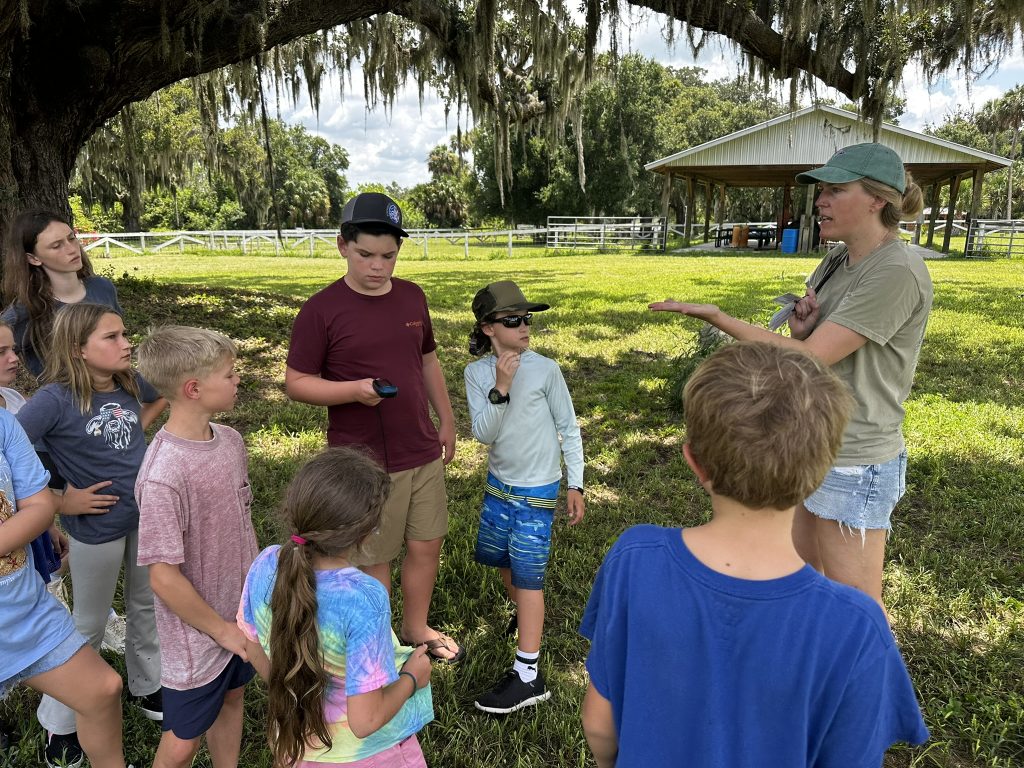 4-H campers learn how GPS works and learn to navigate with it.