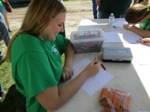 Participant answering questions on a form