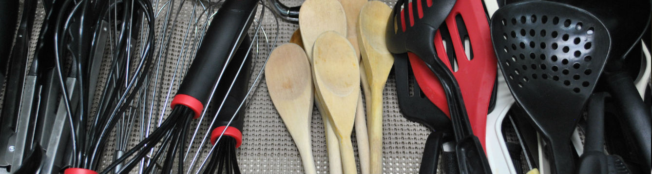organized utensils in kitchen drawer