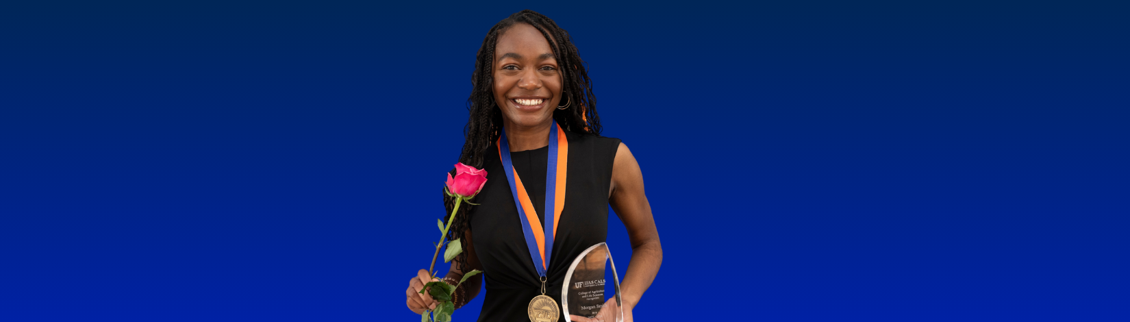 Morgan Smith with medal and recognition plaque at the 2026 CALS Awards Ceremony