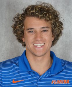 Logan headshot wearing a blue striped polo shirt, Homestyle-2 program | Food Science and Human Nutrition UF/IFAS