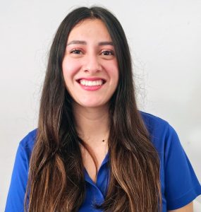 Claudia headshot wearing a dark blue short-sleeved shirt, contamination | Food Science and Human Nutrition UF/IFAS