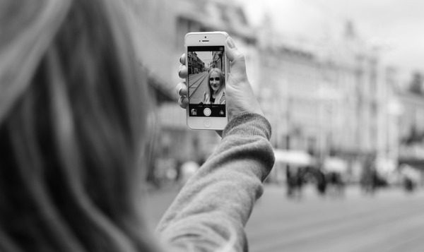 teen taking selfie