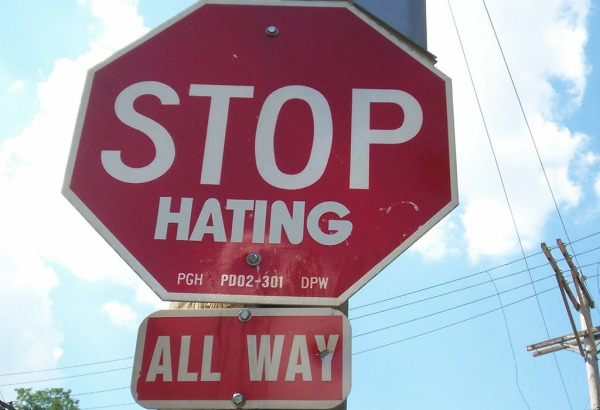 stop hating sign