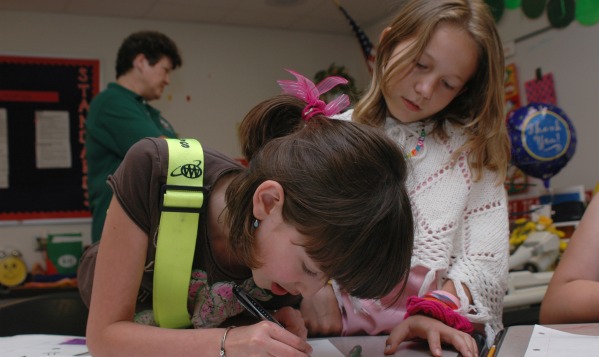 kids working in school