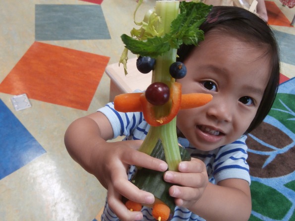 child with vegetable person
