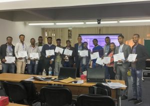 DSSAT workshop graduates from ethiopia. A gorup of 12 people holding diplomas.