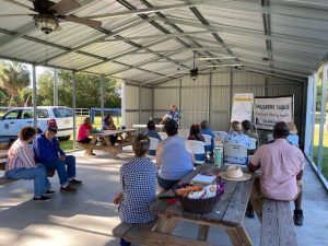people in outdoor classroom
