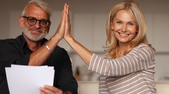 Man and woman doing a high five
