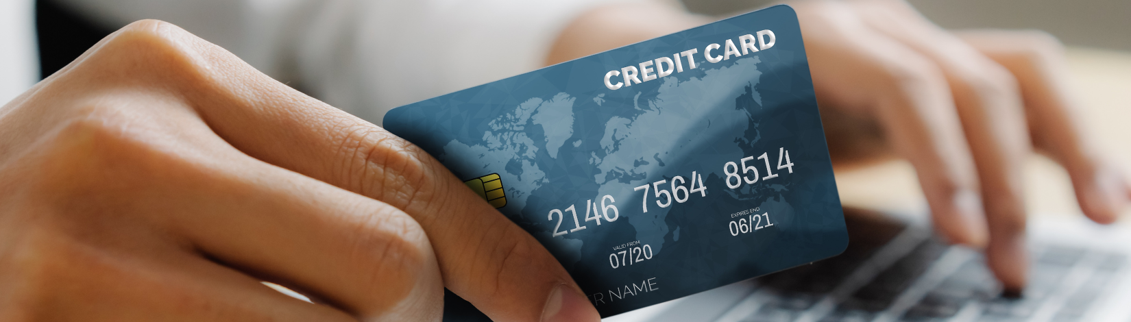 Hand Holding Credit Card