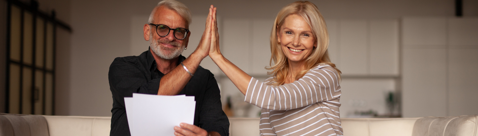 Man and woman doing a high five