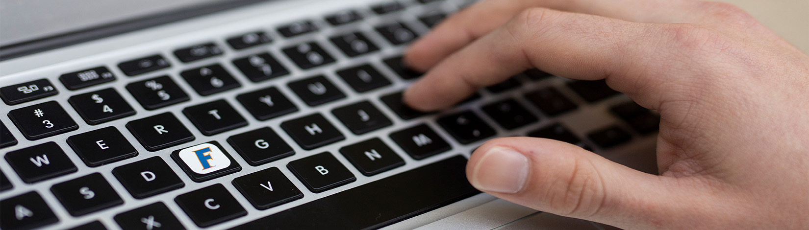Hand on a computer keyboard. Photo taken 10-27-21. UF/IFAS Photo by Tyler Jones.