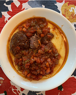 A steaming bowl of hot Osso Bucco, or stewed beef shanks. Recipe and photo by Elizabeth Fojtik