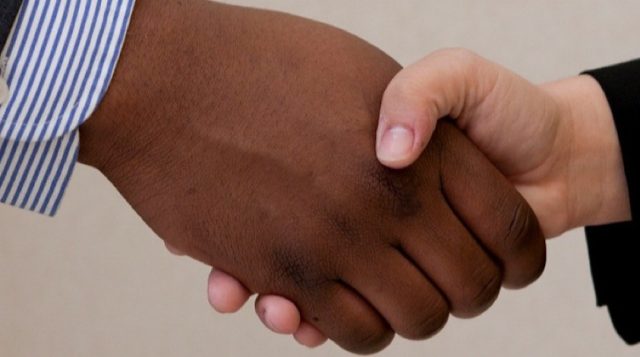 two people shaking hands