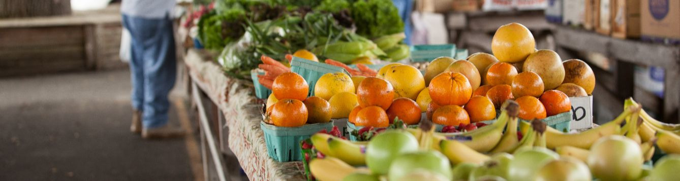 A table of fresh fruit and produce at a farmer's market