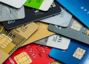 Stack of multicolored credit cards close-up
