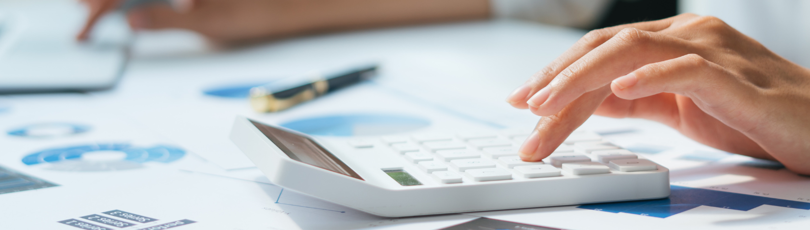 Business accounting concept, Business man using calculator with computer laptop, budget and loan paper in office.