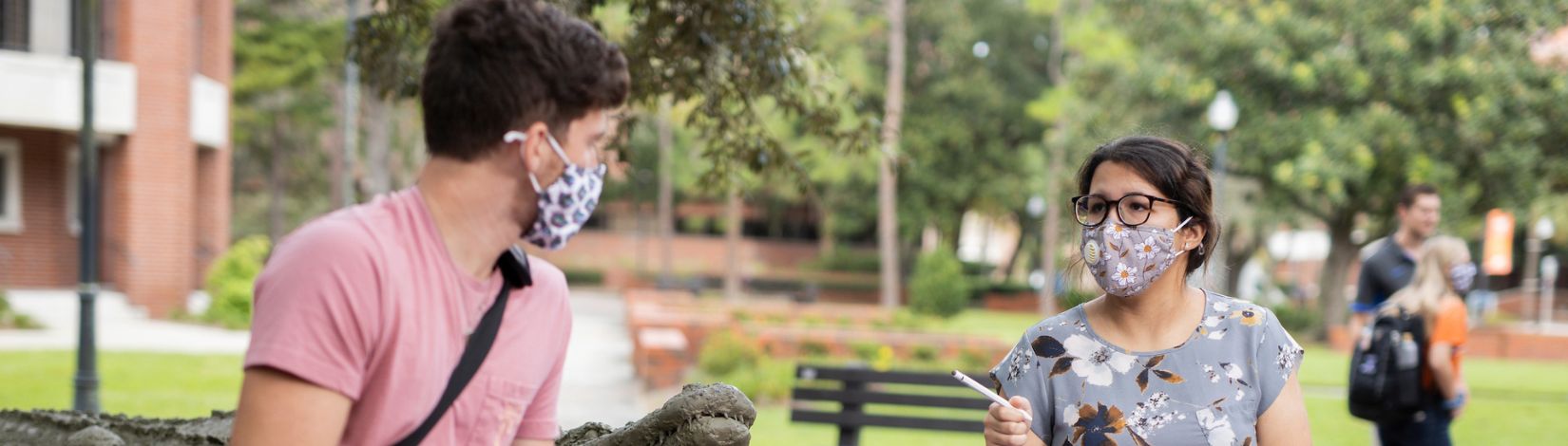 CALS students studying and socializing on campus while taking Covid-19 mask and social distancing