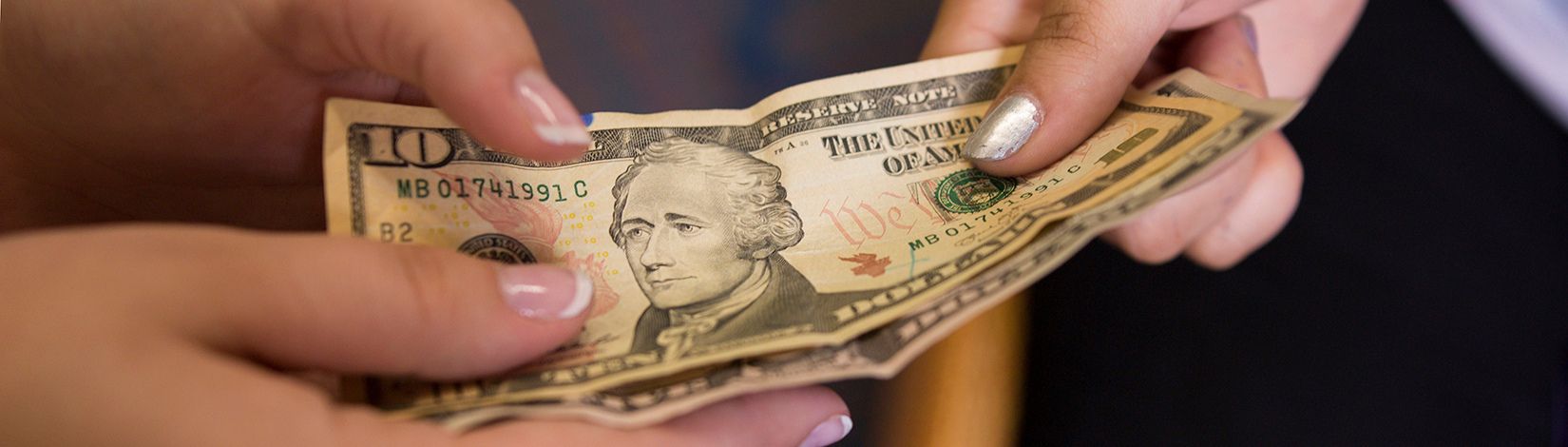 Money changing hands.