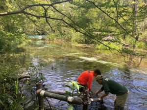 SRWMD staff conducting a turbidity test 