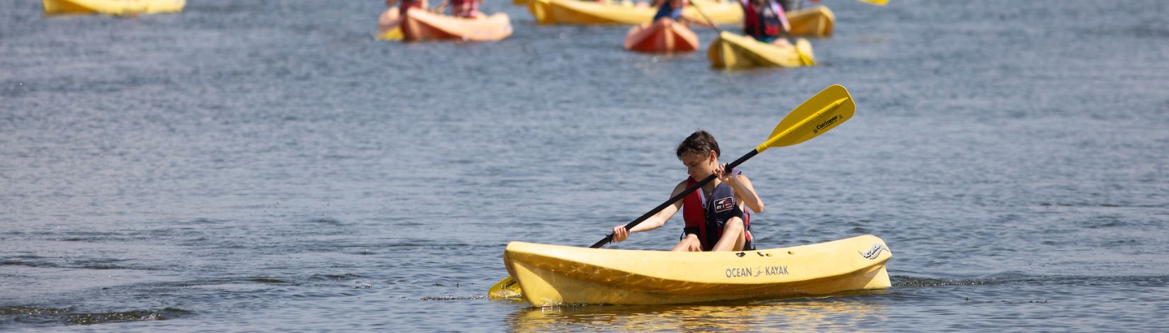 4H youth in a kayaking class at Camp Cloverleaf. Photo taken 07-19-22. UF/IFAS Photo by Tyler Jones. File 027186