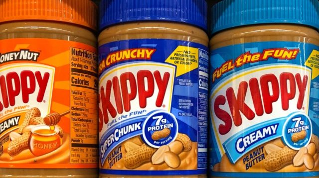 Jars of colorful peanut butter